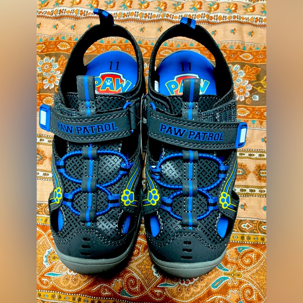Brand new never been worn pair of Paw Patrol gym shoes for children… so cute!